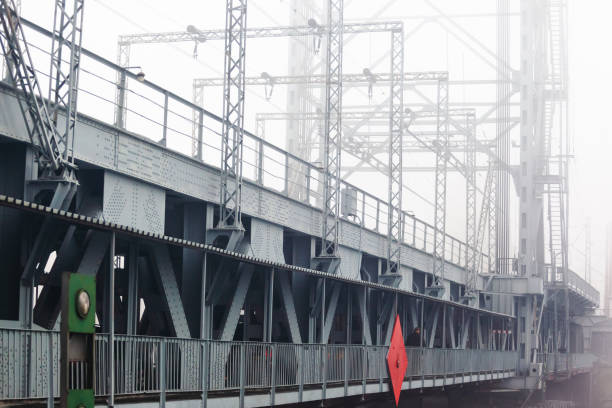 istock big metal bridge in thick heavy fog 1135832359