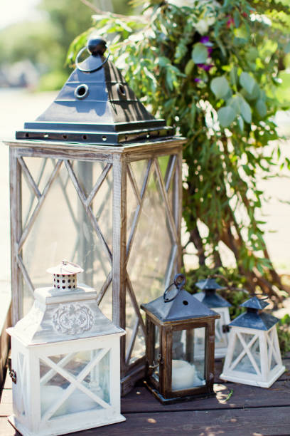 istock vintage lanterns with candles and fern 1135833865