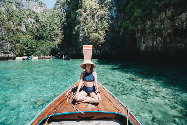 istock Young woman on a longtail boat in Thailand, Phi Phi Island 1135834027