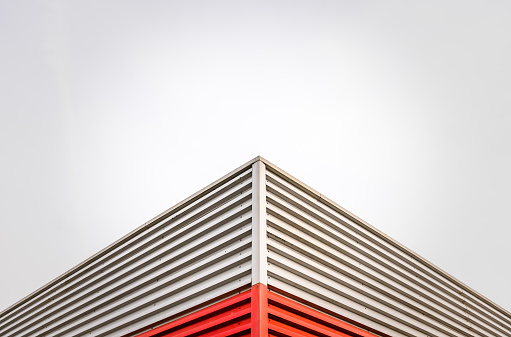 Abstract Architecture Detail Of A Factory Roof Corner Against An Overcast Sky With Copy Space