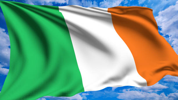 istock flag of Ireland with fabric structure against a cloudy sky 1135844091