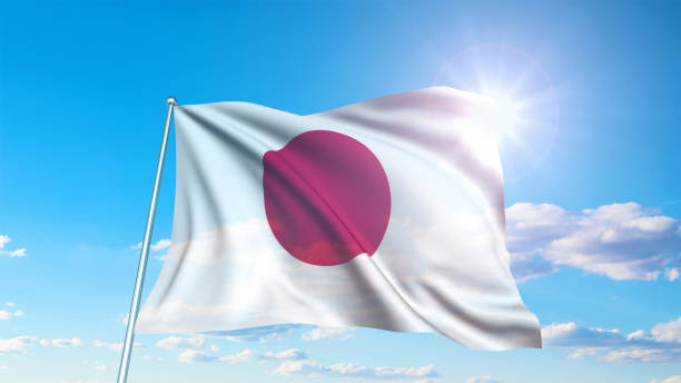 istock flag of Japan with fabric structure against a cloudy sky 1135844111