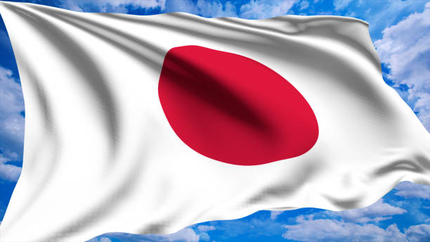 istock flag of Japan with fabric structure against a cloudy sky 1135844112