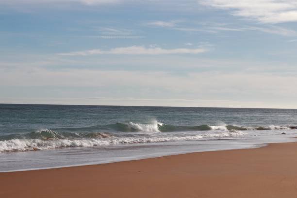 istock Waves in sea with white foam 1135846413