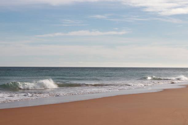 istock Waves in sea with white foam 1135846422