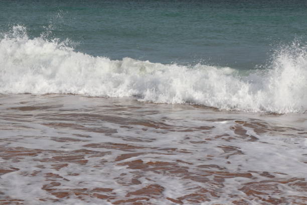 istock Waves in sea with white foam 1135846520