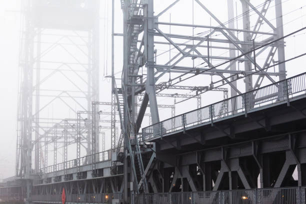 istock big metal bridge in thick heavy fog 1135847675