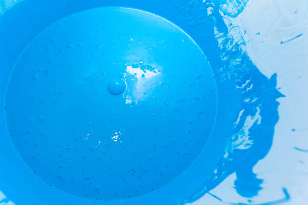 istock bright light blue paint in a bucket 1135847767