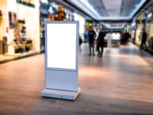 istock Digital media blank black and white screen modern panel, signboard for advertisement design in a shopping centre, gallery. Mockup, mock-up, mock up with blurred background, digital kiosk. 1135849458