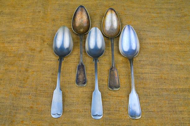 istock Old spoons on a bagging background. Five vintage spoons. Top view. Free space for text 1135849589