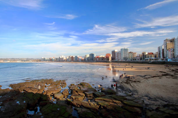 istock Main view of San Lorenzo beach with Gijon downtown on background during a sunny Easter evening, Asturias, Spain 1135853890