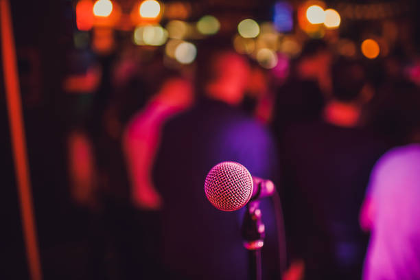 istock Microphone. Microphone close-up. A pub. Bar. A restaurant. Classical music. Music. 1135855530