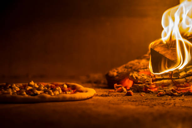 istock Pizza on the wood fire oven 1135855639