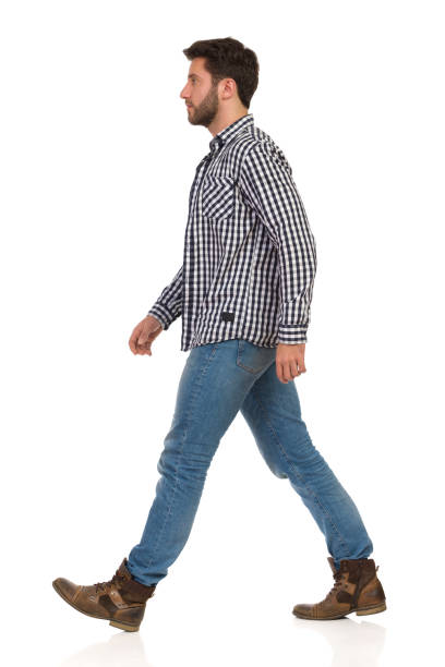 istock Walking Man In Lumberjack Shirt, Jeans And Boots 1135855822