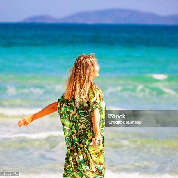 Beautiful Woman Enjoying Summer Vacation Stock Photo - Download Image Now - Sarong, Adult, Adults Only