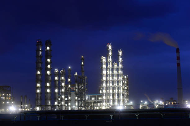 istock Modern factory at night 1135862316