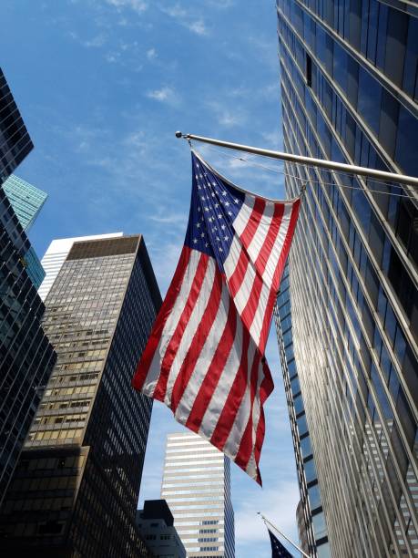 istock American flag and office buildings 1135874025