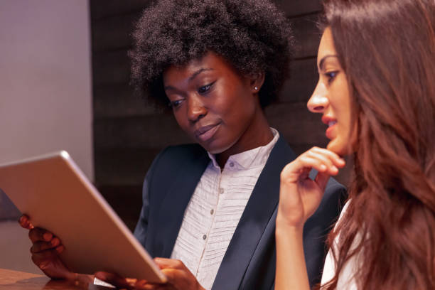 istock Girls Surfing the Internet Using a Digital Tablet 1135874822