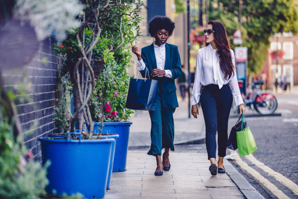 istock Girls Enjoying a Shopping Day While Visiting London 1135877164