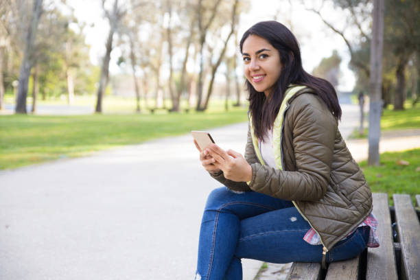istock Cheerful attractive girl interacting on social media 1135880973