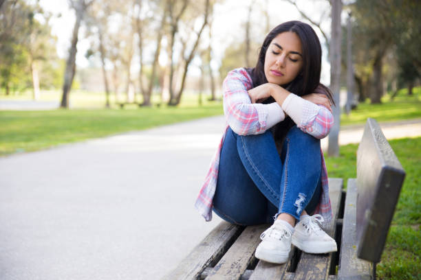 istock Peaceful girl resting in park 1135881047