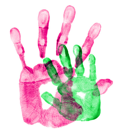 Hand prints of father and daughter.