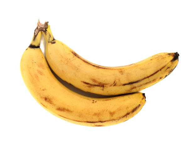 istock Two yellow ripe banana isolated on white background close up 1135888436
