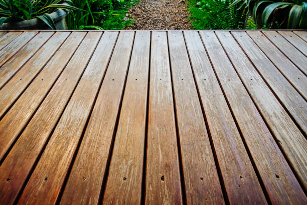istock Old wooden deck in garden. 1135891591