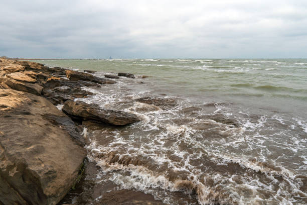 istock Rocky sea coast in cloudy weather 1135892864