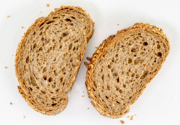 istock Brown bread slices isolated on white background 1135894923