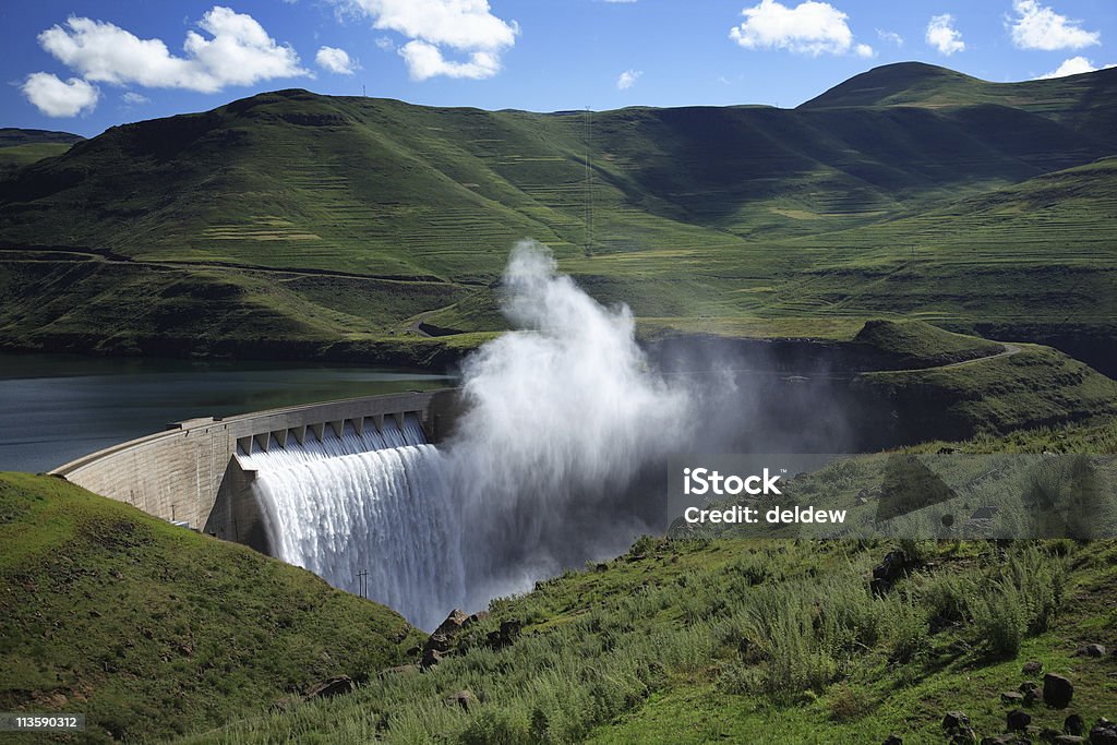 Mist rising above the Katse dam wall in Lesotho  Hydroelectric Power Stock Photo
