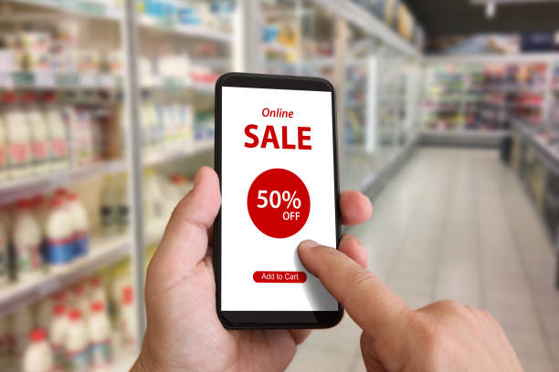 istock Shopping sale e-commerce marketing mobile phone app coupon 1135906307