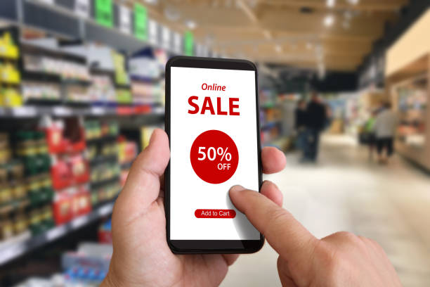 istock Shopping sale e-commerce marketing mobile phone app coupon 1135906339