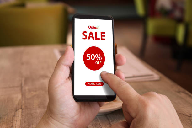 istock Shopping sale e-commerce marketing mobile phone app coupon 1135906957