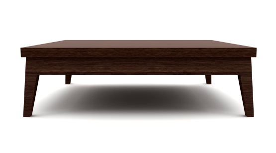 Moderna marrón mesa de madera aislada sobre fondo blanco photo