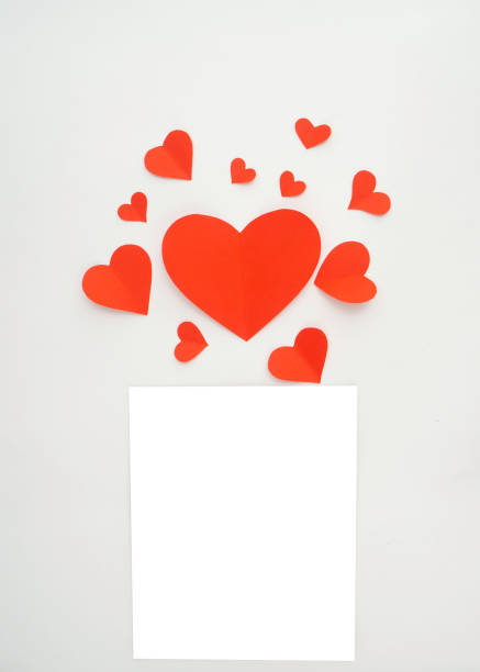 istock Red paper hearts isolated on white 1135907632
