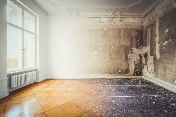 apartment room during renovation, before and after restoration /  refurbishment - merged