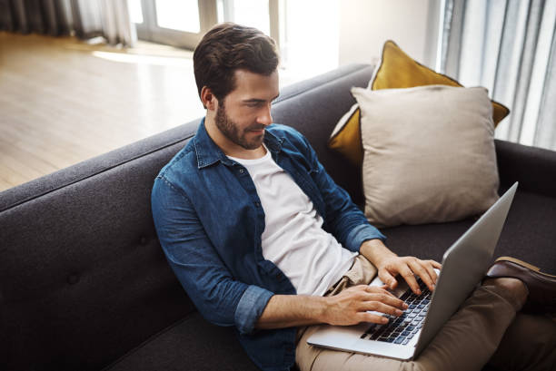 istock Taking it easy today and handling some business from home 1135911883