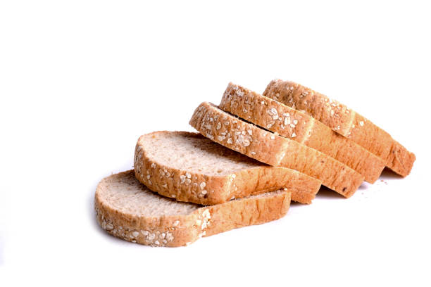 istock Slice whole wheat bread isolated on white background. 1135915350