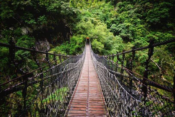 One of a small bridge made of wood and rope in the middle of Taroko National Park hiking trail in Hualien, Taiwan