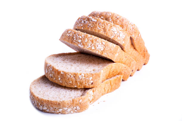 istock Slice whole wheat bread isolated on white background. 1135915409
