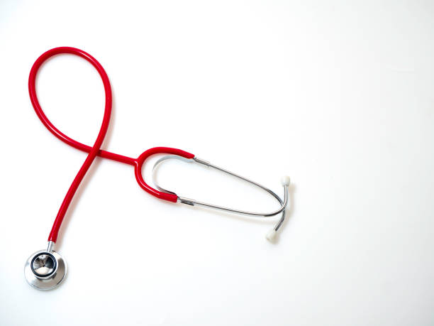 istock Red Stethoscope on white background. Health care concept 1135915843