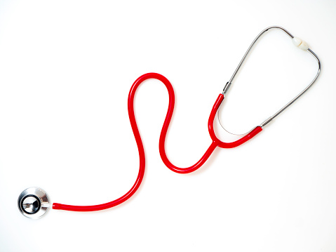 Red Stethoscope on white background. Health care concept, World Medical Day