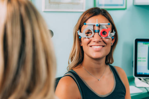 istock Optometrist Examining Patient At Clinic 1135920706
