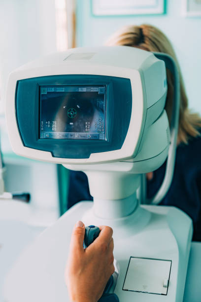 istock Optometrist Examining Patient At Clinic 1135920712