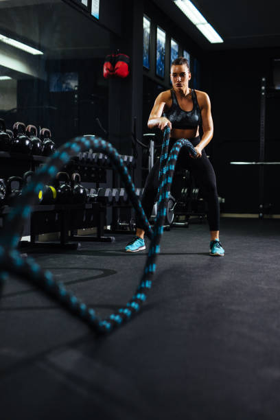 istock Battle ropes session at the gym 1135922806