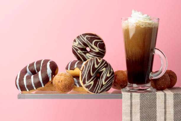 Chocolate donuts and coffee cocktail with cream.