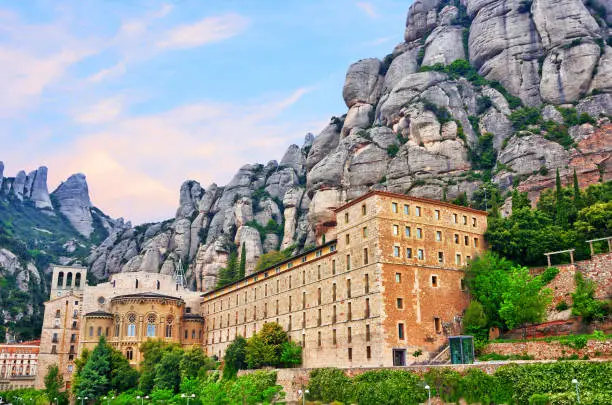 Santa Maria de Montserrat is a Benedictine abbey located on the mountains near Barcelona, Spain