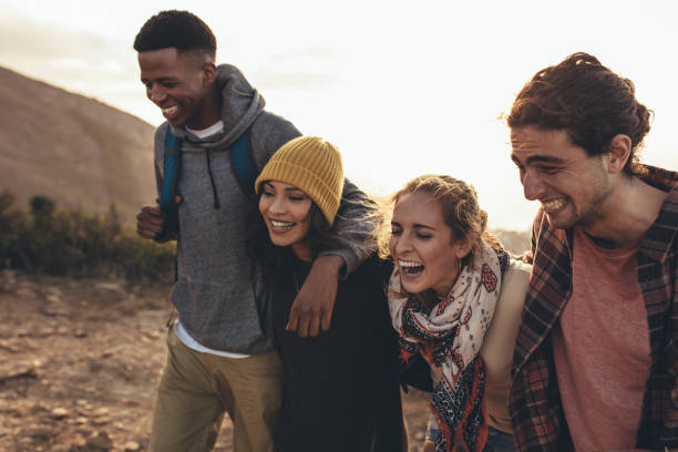 istock Social networking friends on hiking trip 1135932354