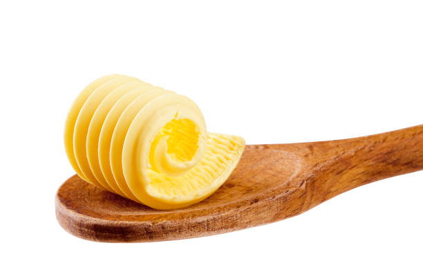 istock Butter curl on a wooden spoon 113593398